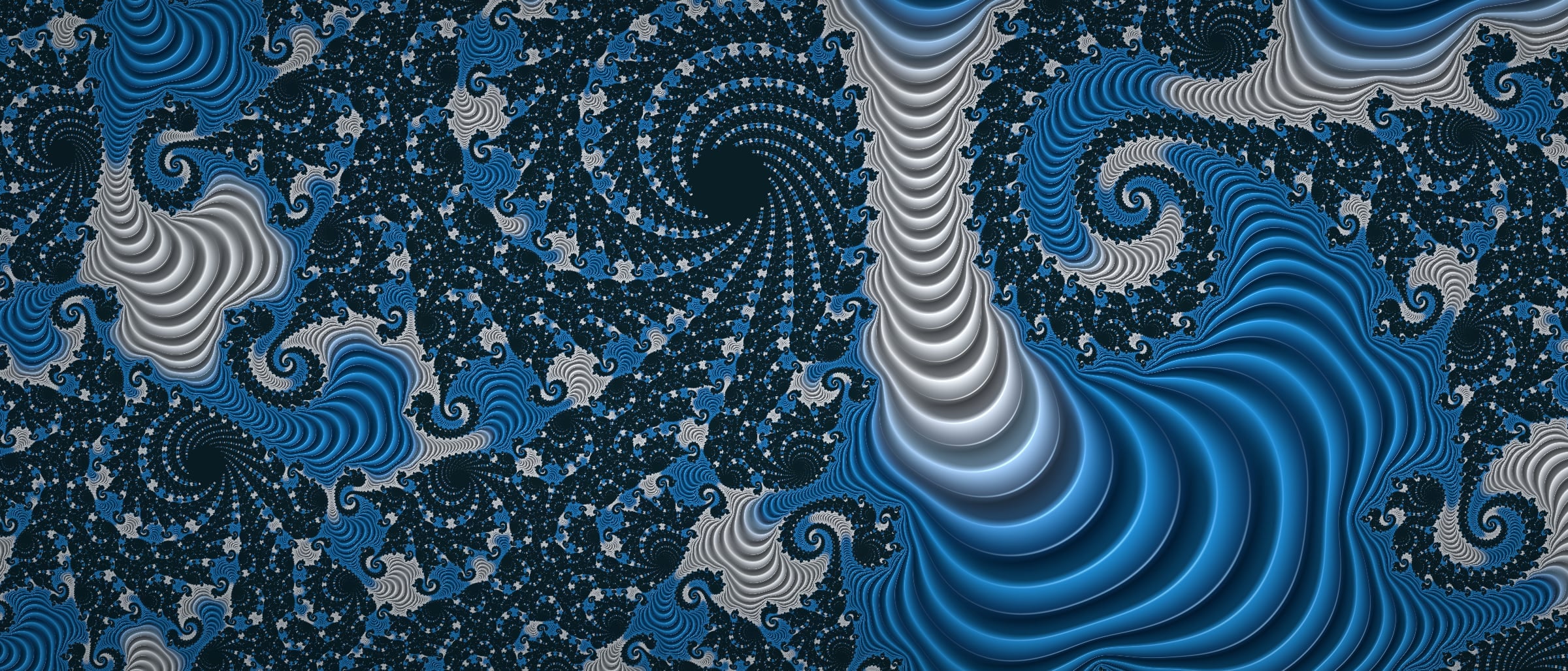512옥타브 확대 경로 위에서 청색과 은빛 부조로 칠한 Mandelbrot 집합의 소용돌이
